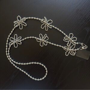 Beaded silver flowers phone strap